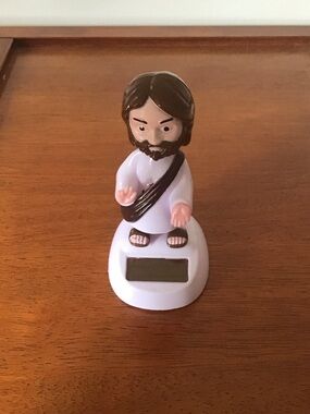 White Solar-Powered Jesus Figurine
